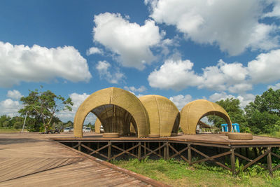 View of bridge against cloudy sky