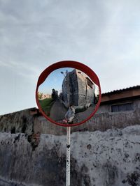 Low angle view of basketball hoop against sky