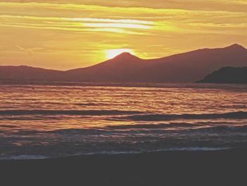 Scenic view of sea against sky during sunset