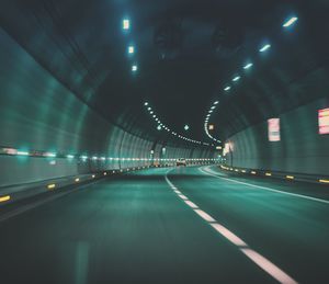 Illuminated road at night