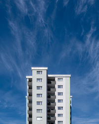 Low angle view of building against blue sky