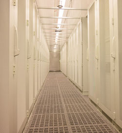 Cold aisle and front view of server racks in a data center