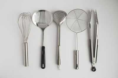 High angle view of objects on table against white background