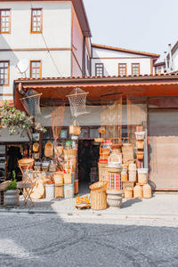 Street market against buildings in city