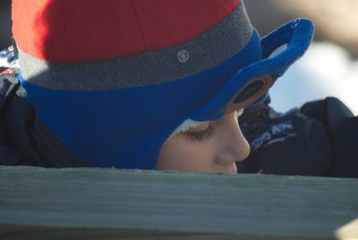 Close-up portrait of boy wearing hat