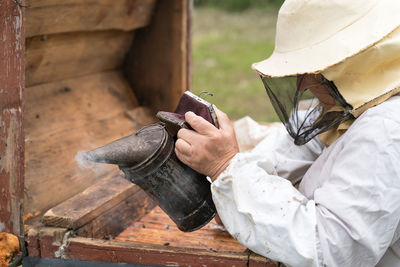 Man working on wood