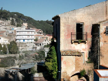 Houses against clear sky