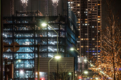 Illuminated buildings in city at night