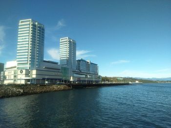 Buildings in distance with waterfront