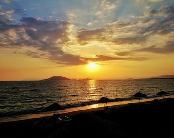 Scenic view of sea at sunset