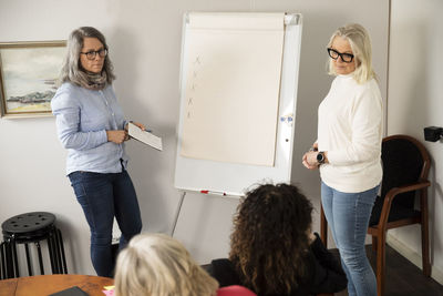 Businesswomen having presentation during business meeting