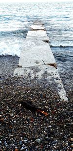High angle view of stones on beach