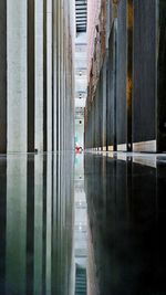 Road amidst buildings in city