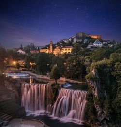 Scenic view of waterfall at night