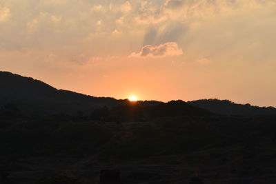 Scenic view of silhouette landscape against sky during sunset