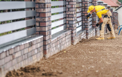 Mature man working on construction site