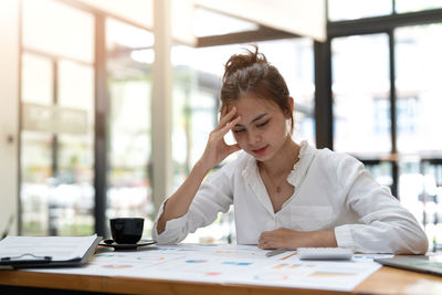 Businesswoman working at office