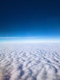 Aerial view of clouds against blue sky