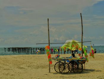 Shop on beach by sea against sky.. east venice, kerala 