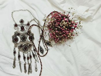 High angle view of wedding rings on table