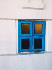 Full frame shot of window on white wall