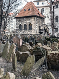 Exterior of old building by house during winter