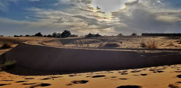 Scenic view of desert against sky