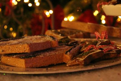 Close-up of illuminated lamp at night