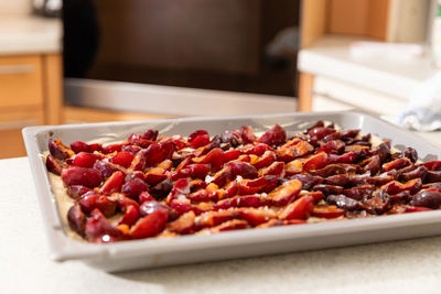 Close-up of plum in plate on table