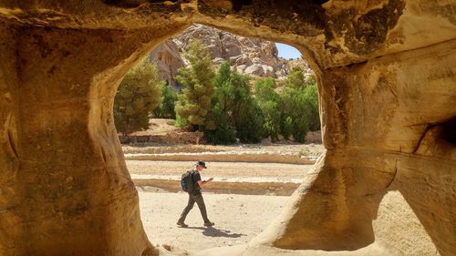 Man standing on rock formation