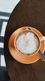 Close-up of coffee cup on table