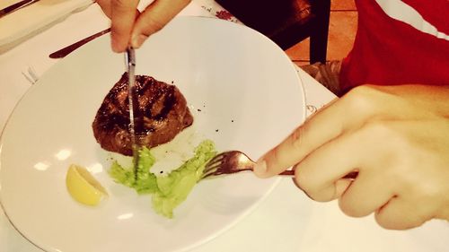 Close-up of woman eating food