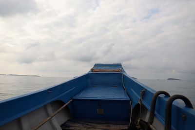 Boat in sea against sky