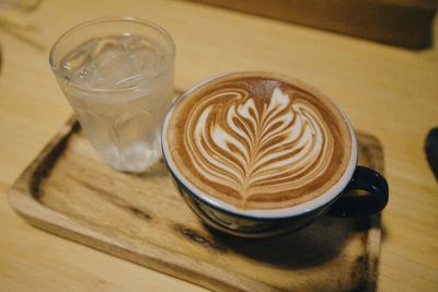 Close-up of coffee cup on table