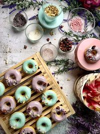 Flatlay  view of food on table, donuts on table, decorated donuts 