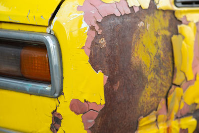 Close-up of yellow rusty metal