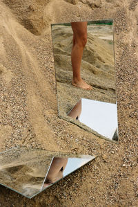 Low section of woman on beach