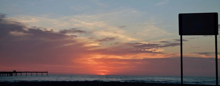 Scenic view of sea at sunset