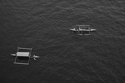 High angle view of chair on sea