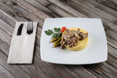 High angle view of food in plate on table