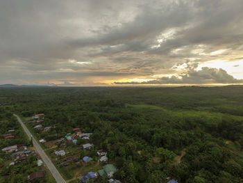 High angle view of field against sky during sunset
