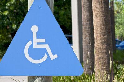 Close-up of sign on field