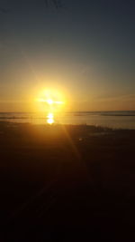 Scenic view of sunset over sea