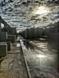 View of road against cloudy sky