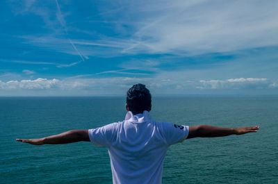 Scenic view of sea against cloudy sky