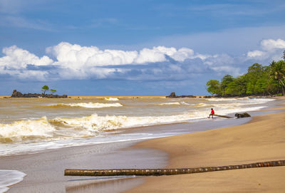 Scenic view of beach against sky