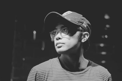 Portrait of young man looking away