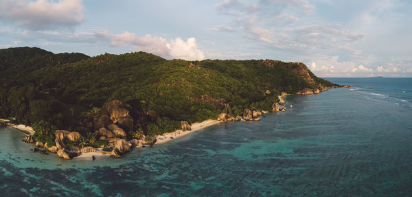 Panoramic view of bay against sky