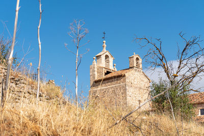 Low angle view of moya's church against clear sky