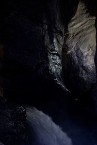 Low angle view of rock formation in water